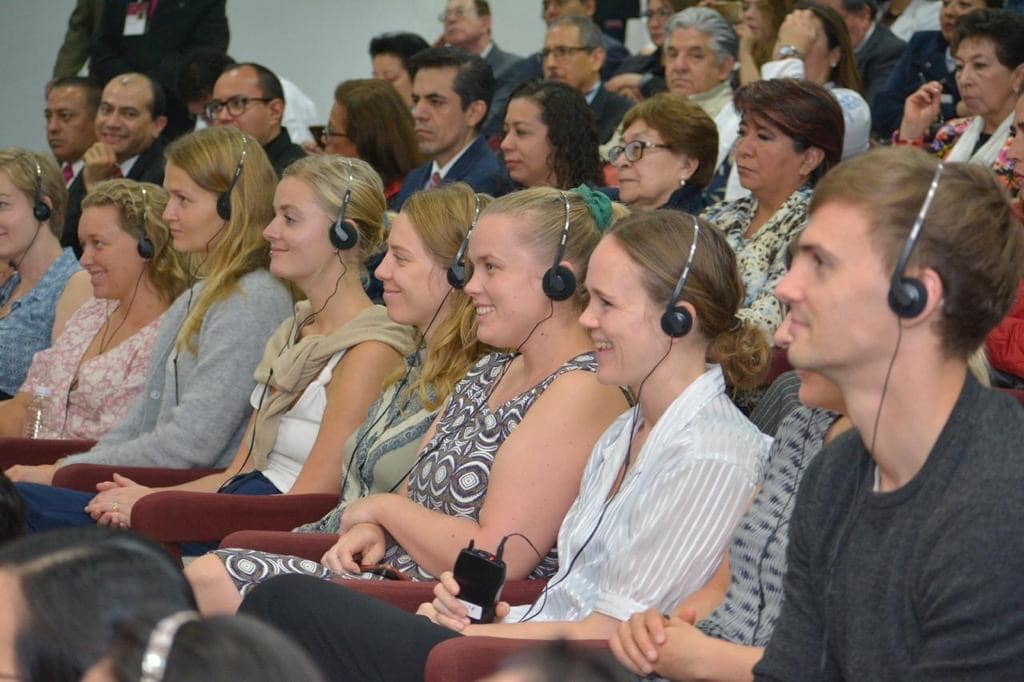 The students listening at a health conference