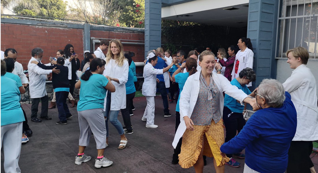 Students dancing with patients at hospital in Mexico